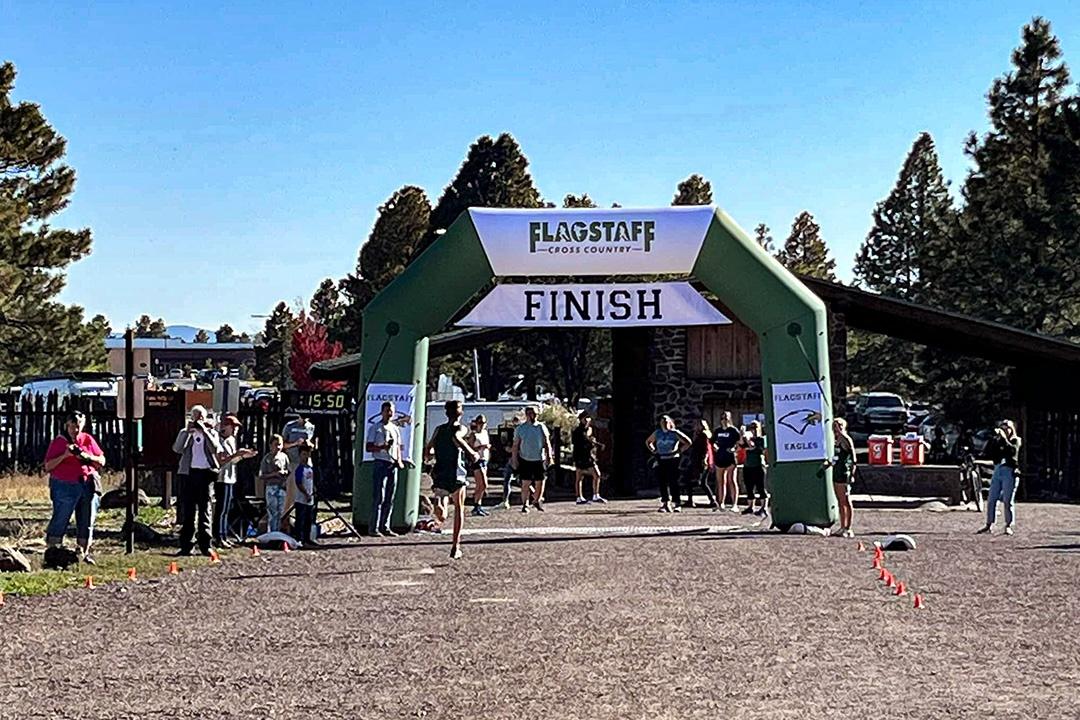 Giant Inflatable Arch Gets Cross-Country Team to the Finish Line