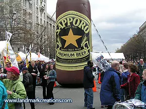 Inflatable Sapporo Beer Bottle Displayed at Cherry Blossom Festival