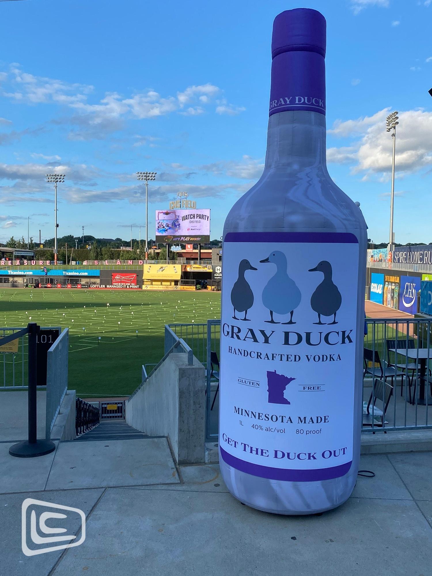 Gray Duck Vodka Bottle at Baseball Game